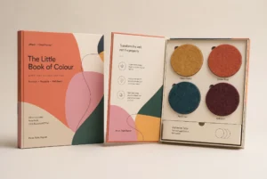 The Little Book of Colour DwellForms sample kit with four recycled PET felt colour discs and adhesive tabs