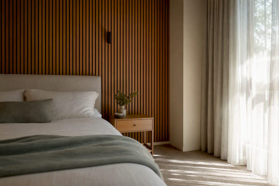 Five ways to build a bedroom statement wall that actually works 2 Vertical wooden slat bedroom wall panels
