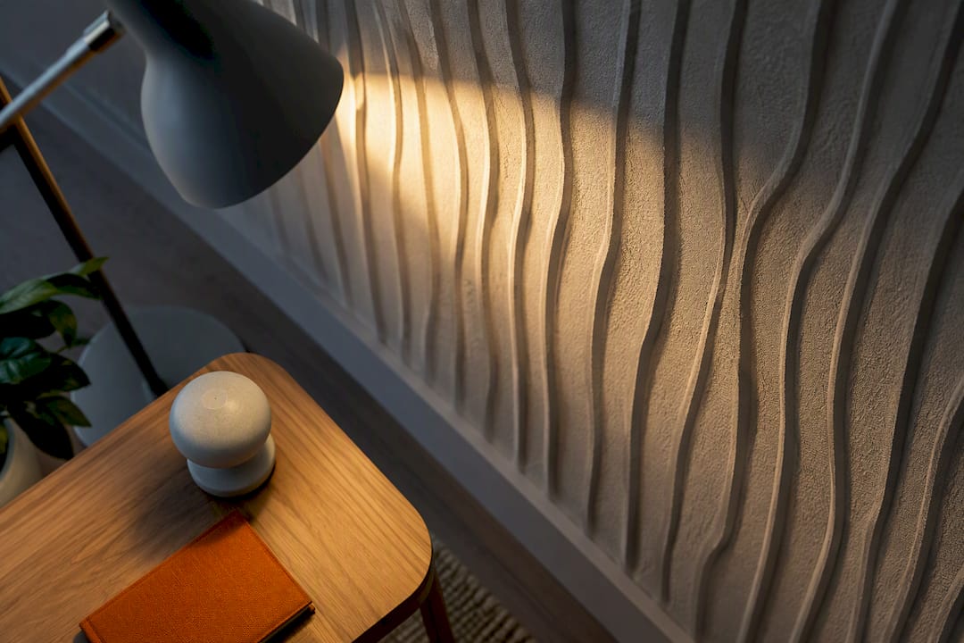 Add Depth Without Drilling: 10 3D Wall Decor Ideas for Renters 4 Raking light deepening textured wall relief