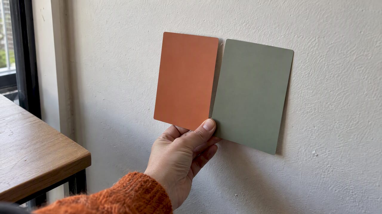 Home Office Colors for Focus: Test a Feature Wall Without Paint 2 Two colour samples compared beside a home office desk
